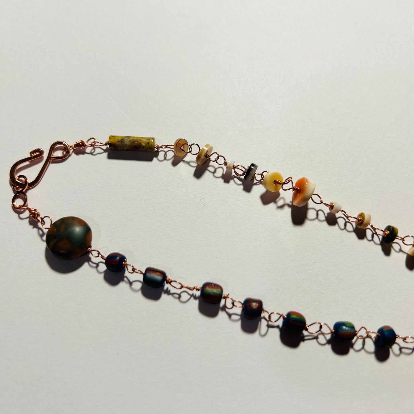 Handmade Beaded Necklace


16.5 inches in length, non-adjustable, rose gold plated hook & eye closure 


Created With: Rose Gold Plated Copper Wire, Vintage Trade Beads, Gemstone Beads: Sodalite, Magnesite, Jasper, & Various Shell Beads