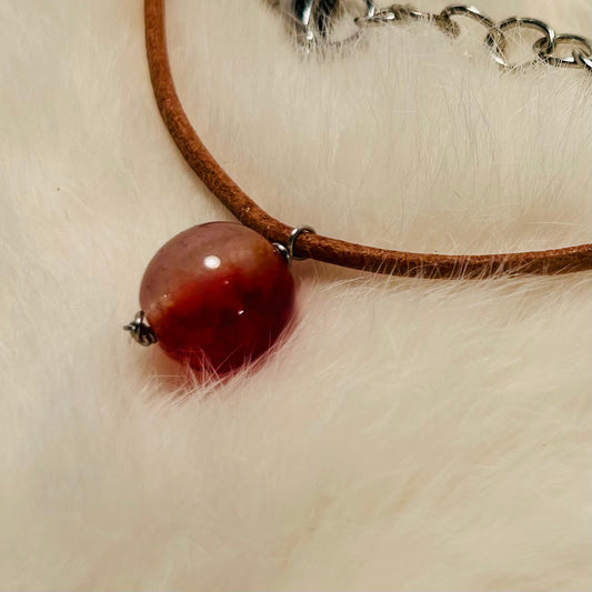 Handmade gemstone pendant necklace, adjustable, with hypoallergenic surgical steel.

Made with genuine leather cordage.